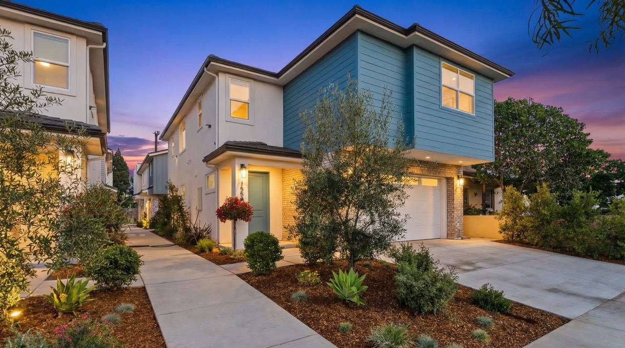 Plan B exterior at twilight, with sunset sky over Clearwater Collection