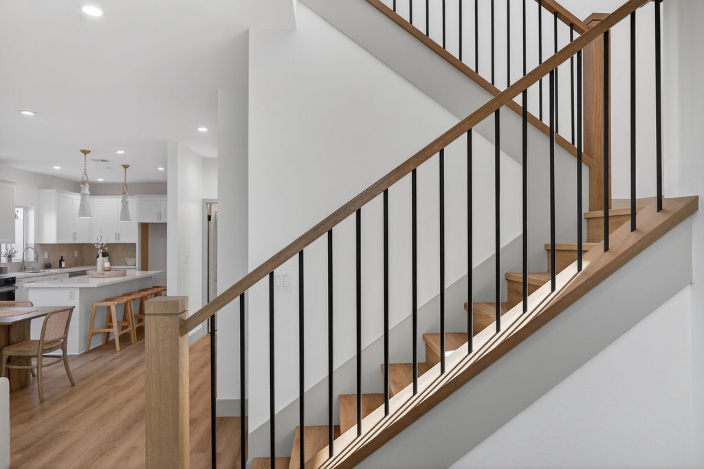 Plan B staircase with oak treads and black metal balusters